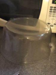 Plastic bottles, plastic gallons of water jugs, plastic cake cover, and plastic bowls